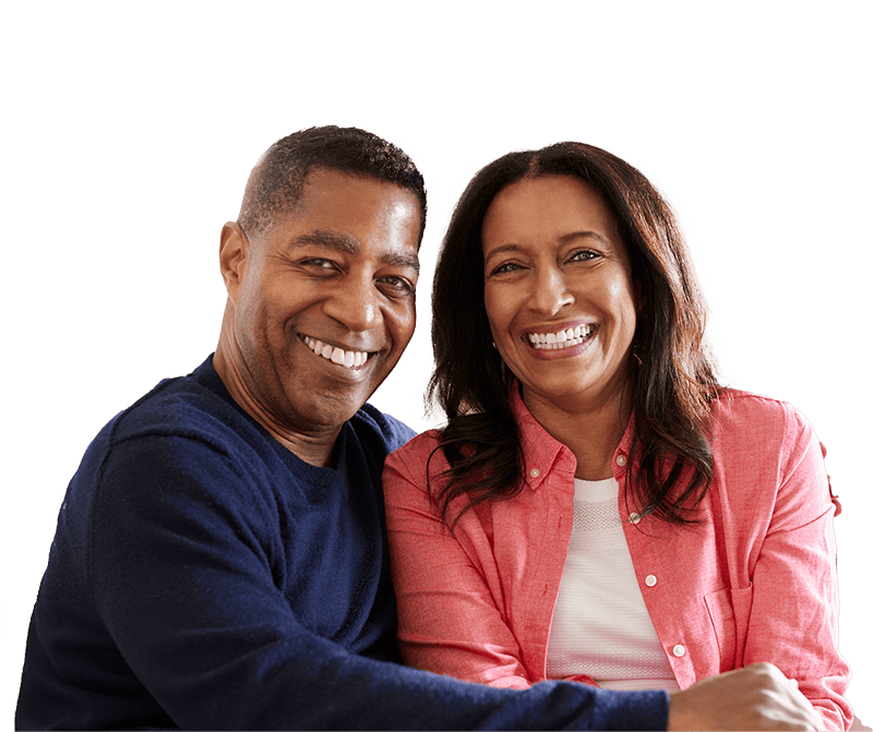 middle-aged couple displays beautiful smiles showing health teeth and gums